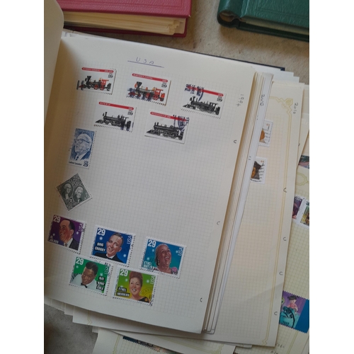 134 - Stamps of USA in three folders 1000 plus stamps mint unused and used, only a small sample photograph... 