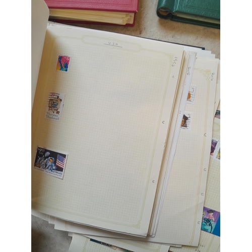 134 - Stamps of USA in three folders 1000 plus stamps mint unused and used, only a small sample photograph... 