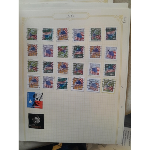 134 - Stamps of USA in three folders 1000 plus stamps mint unused and used, only a small sample photograph... 