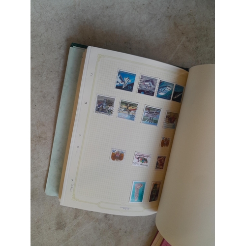 134 - Stamps of USA in three folders 1000 plus stamps mint unused and used, only a small sample photograph... 