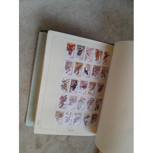 134 - Stamps of USA in three folders 1000 plus stamps mint unused and used, only a small sample photograph... 
