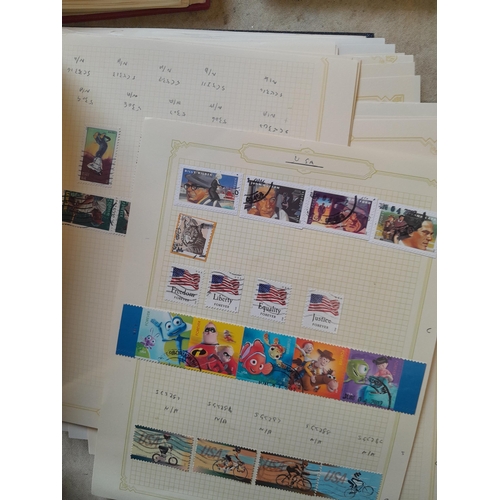 134 - Stamps of USA in three folders 1000 plus stamps mint unused and used, only a small sample photograph... 