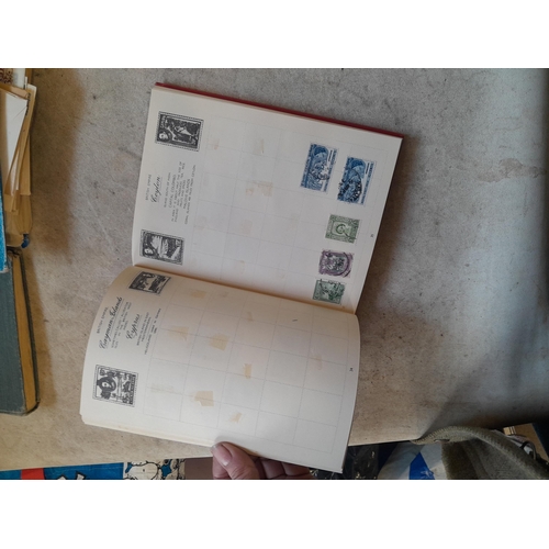 136 - Stamps: a box of stamps albums, ice cream carton of stamps on paper and loose, mixed era world stamp... 