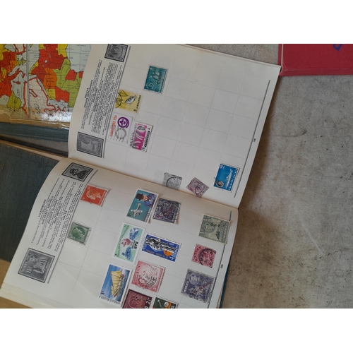 136 - Stamps: a box of stamps albums, ice cream carton of stamps on paper and loose, mixed era world stamp... 