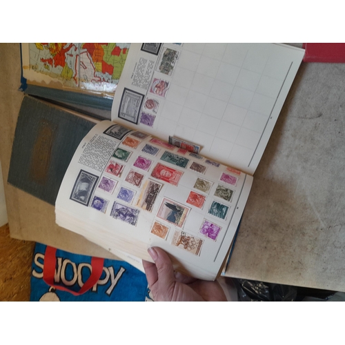 136 - Stamps: a box of stamps albums, ice cream carton of stamps on paper and loose, mixed era world stamp... 