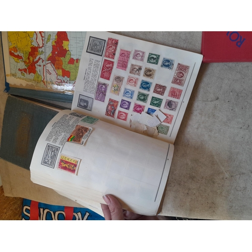 136 - Stamps: a box of stamps albums, ice cream carton of stamps on paper and loose, mixed era world stamp... 