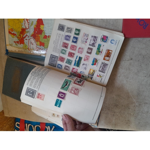 136 - Stamps: a box of stamps albums, ice cream carton of stamps on paper and loose, mixed era world stamp... 