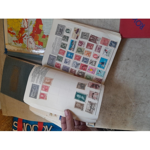 136 - Stamps: a box of stamps albums, ice cream carton of stamps on paper and loose, mixed era world stamp... 