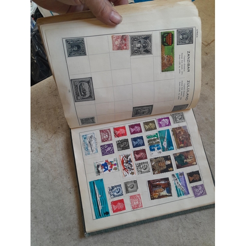136 - Stamps: a box of stamps albums, ice cream carton of stamps on paper and loose, mixed era world stamp... 