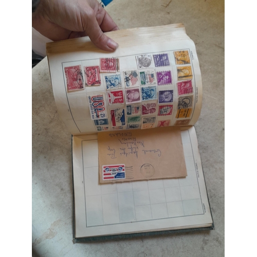 136 - Stamps: a box of stamps albums, ice cream carton of stamps on paper and loose, mixed era world stamp... 