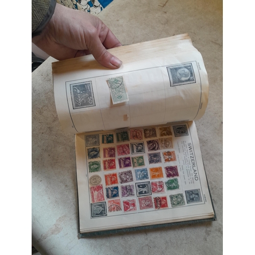136 - Stamps: a box of stamps albums, ice cream carton of stamps on paper and loose, mixed era world stamp... 