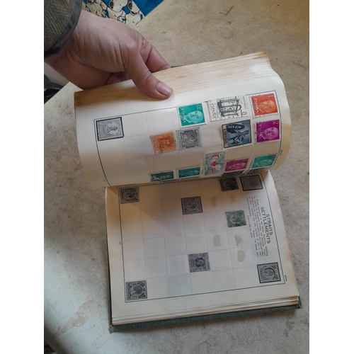 136 - Stamps: a box of stamps albums, ice cream carton of stamps on paper and loose, mixed era world stamp... 