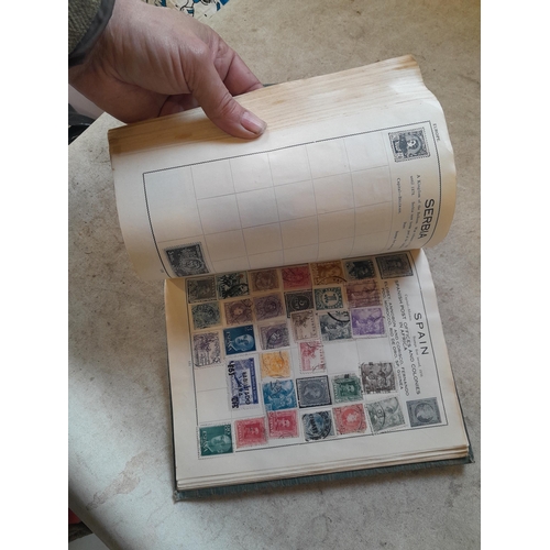 136 - Stamps: a box of stamps albums, ice cream carton of stamps on paper and loose, mixed era world stamp... 