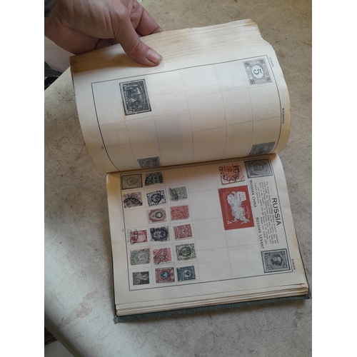 136 - Stamps: a box of stamps albums, ice cream carton of stamps on paper and loose, mixed era world stamp... 