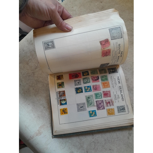 136 - Stamps: a box of stamps albums, ice cream carton of stamps on paper and loose, mixed era world stamp... 