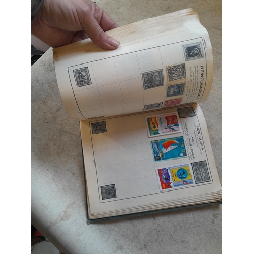 136 - Stamps: a box of stamps albums, ice cream carton of stamps on paper and loose, mixed era world stamp... 