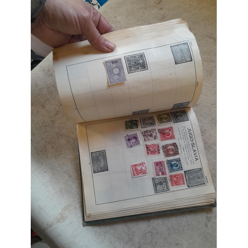 136 - Stamps: a box of stamps albums, ice cream carton of stamps on paper and loose, mixed era world stamp... 