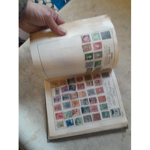 136 - Stamps: a box of stamps albums, ice cream carton of stamps on paper and loose, mixed era world stamp... 