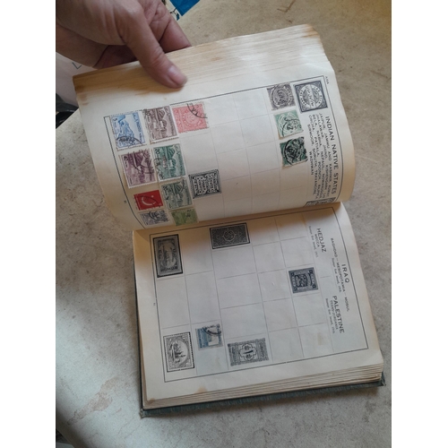 136 - Stamps: a box of stamps albums, ice cream carton of stamps on paper and loose, mixed era world stamp... 