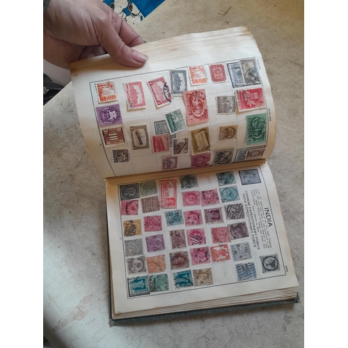 136 - Stamps: a box of stamps albums, ice cream carton of stamps on paper and loose, mixed era world stamp... 