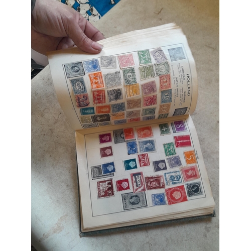 136 - Stamps: a box of stamps albums, ice cream carton of stamps on paper and loose, mixed era world stamp... 