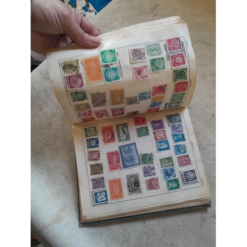 136 - Stamps: a box of stamps albums, ice cream carton of stamps on paper and loose, mixed era world stamp... 