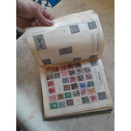 136 - Stamps: a box of stamps albums, ice cream carton of stamps on paper and loose, mixed era world stamp... 