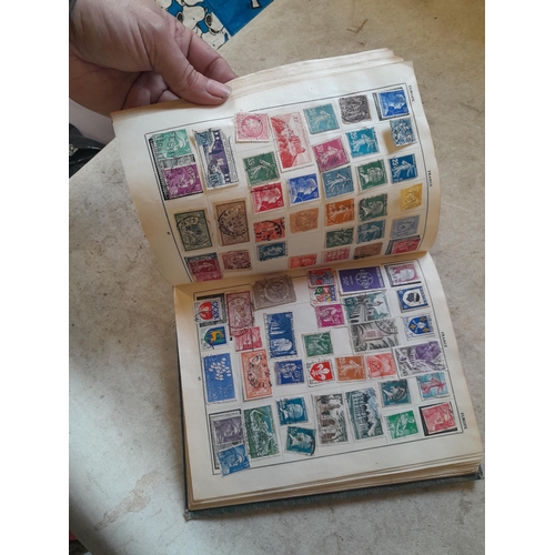 136 - Stamps: a box of stamps albums, ice cream carton of stamps on paper and loose, mixed era world stamp... 