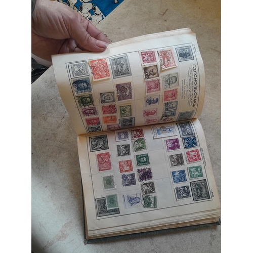 136 - Stamps: a box of stamps albums, ice cream carton of stamps on paper and loose, mixed era world stamp... 