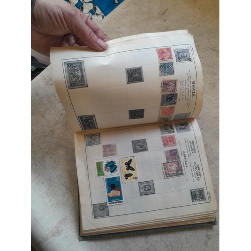 136 - Stamps: a box of stamps albums, ice cream carton of stamps on paper and loose, mixed era world stamp... 