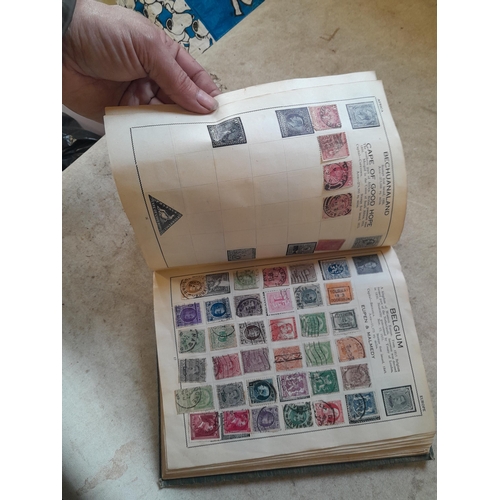 136 - Stamps: a box of stamps albums, ice cream carton of stamps on paper and loose, mixed era world stamp... 