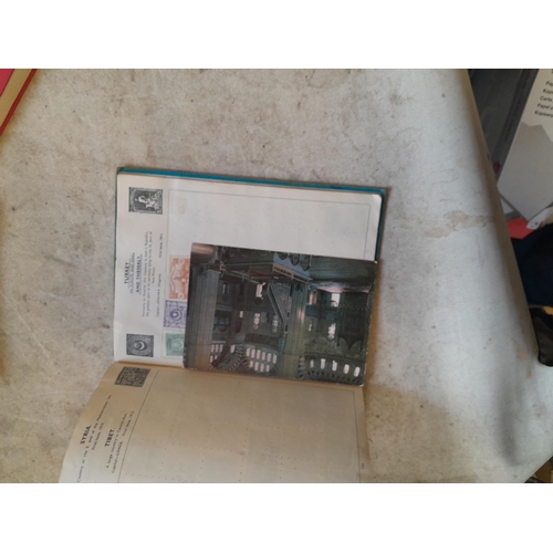 136 - Stamps: a box of stamps albums, ice cream carton of stamps on paper and loose, mixed era world stamp... 