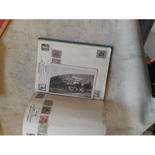 136 - Stamps: a box of stamps albums, ice cream carton of stamps on paper and loose, mixed era world stamp... 