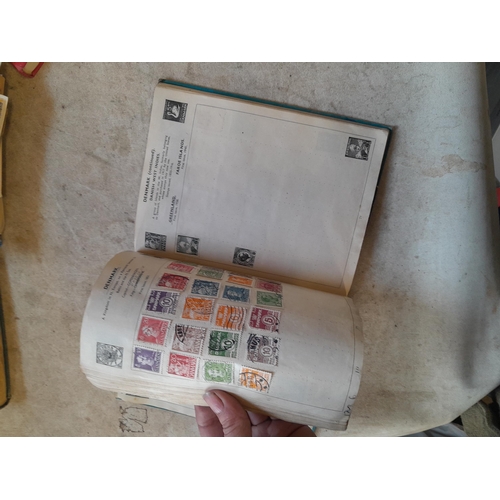 136 - Stamps: a box of stamps albums, ice cream carton of stamps on paper and loose, mixed era world stamp... 