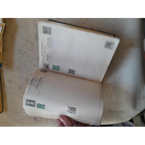 136 - Stamps: a box of stamps albums, ice cream carton of stamps on paper and loose, mixed era world stamp... 