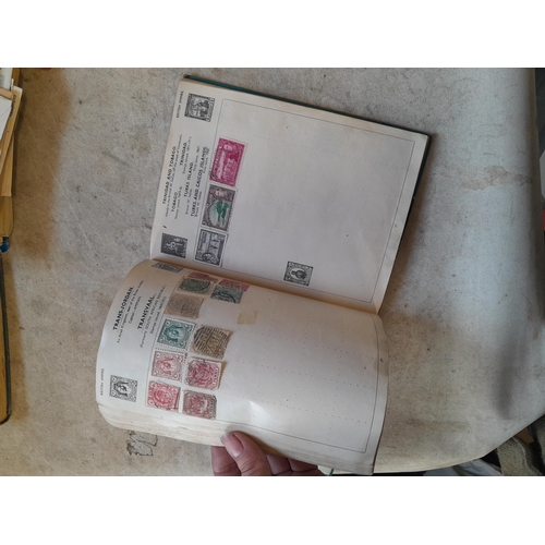 136 - Stamps: a box of stamps albums, ice cream carton of stamps on paper and loose, mixed era world stamp... 