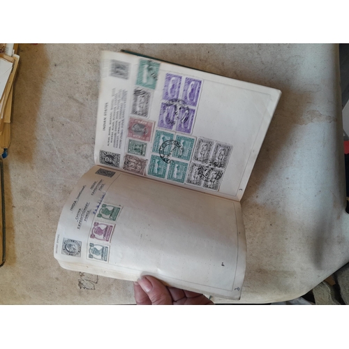 136 - Stamps: a box of stamps albums, ice cream carton of stamps on paper and loose, mixed era world stamp... 