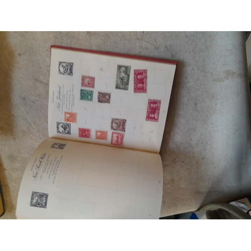 136 - Stamps: a box of stamps albums, ice cream carton of stamps on paper and loose, mixed era world stamp... 