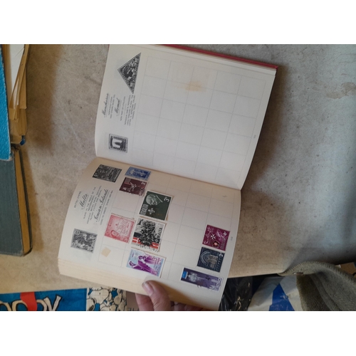 136 - Stamps: a box of stamps albums, ice cream carton of stamps on paper and loose, mixed era world stamp... 