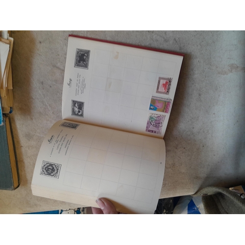 136 - Stamps: a box of stamps albums, ice cream carton of stamps on paper and loose, mixed era world stamp... 