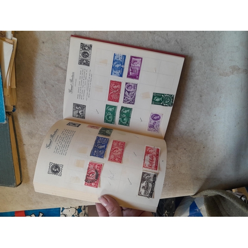 136 - Stamps: a box of stamps albums, ice cream carton of stamps on paper and loose, mixed era world stamp... 