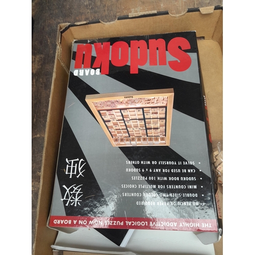 149 - Table lamp, puzzles etc.