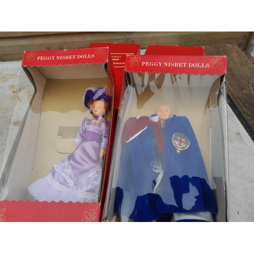 154 - Peggy Nisbet Churchill dolls in box of issue and damaged Capo figure