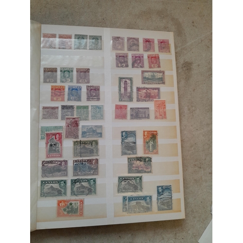 164 - Stamps: World Collection a varied array of Commonwealth and world stamps 32 well filled pages in a L... 