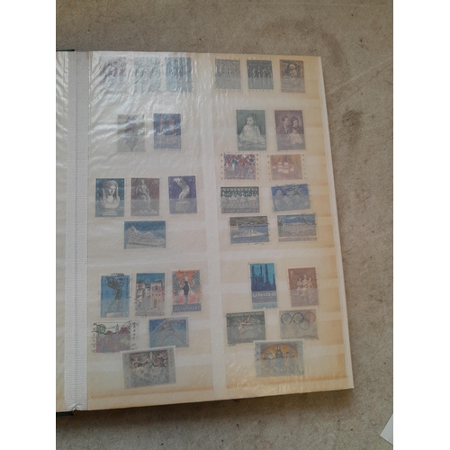 164 - Stamps: World Collection a varied array of Commonwealth and world stamps 32 well filled pages in a L... 
