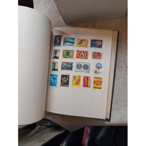 166 - Approx 10 kg of stamps and postcards : loose on paper, in albums, stock books, on pages GB World and... 