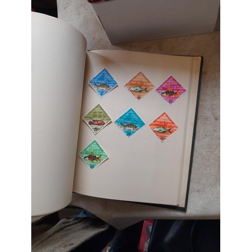 166 - Approx 10 kg of stamps and postcards : loose on paper, in albums, stock books, on pages GB World and... 