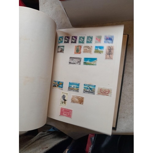 166 - Approx 10 kg of stamps and postcards : loose on paper, in albums, stock books, on pages GB World and... 
