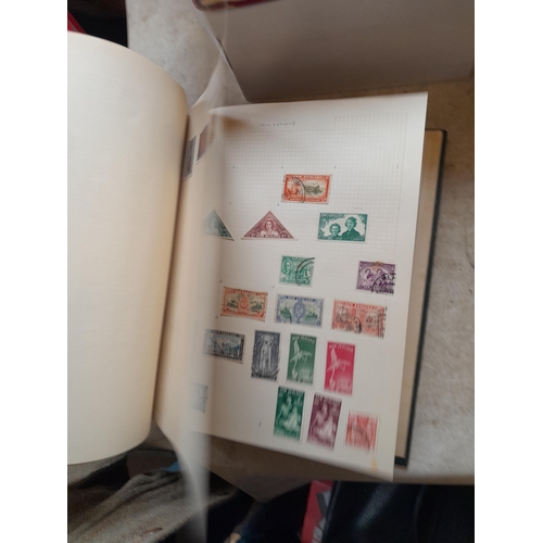 166 - Approx 10 kg of stamps and postcards : loose on paper, in albums, stock books, on pages GB World and... 