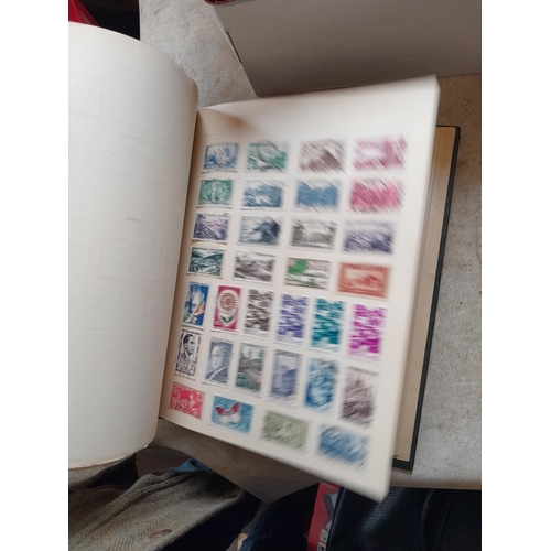 166 - Approx 10 kg of stamps and postcards : loose on paper, in albums, stock books, on pages GB World and... 